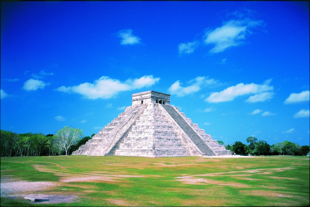 Mayan Pyramid of Kukulkan (also known as El Castillo) and ruins at Chichen Itza, Yucatan Peninsula, Mexico